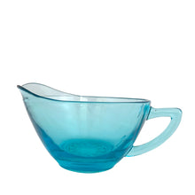 Load image into Gallery viewer, Hazel-Atlas Capri Hobnail creamer in electric turquoise glass, right-side profile showing full spout and loop handle, smooth exterior with hobnail base detail, USA 1950s

