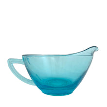 Load image into Gallery viewer, Hazel-Atlas Capri Hobnail creamer in electric turquoise glass, left-side profile with handle in foreground and spout at right, smooth tapered body on footed base, USA 1950s
