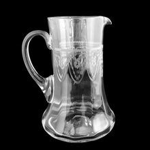 Load image into Gallery viewer, Heisey No. 3350 antique glass pitcher, opposite side view with applied handle and needle-etched Trefoil tatting band, flared scalloped foot, black background

