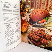 Load image into Gallery viewer, Better Homes and Gardens is known for its fabulous cookbooks. This hardcover cookbook tells the story of in food in American life. Its 400 pages are filled with 705 tasty recipes along with many colour photographs and illustrations. Published by Meredith Corporation, USA, 1975, first edition.   In great vintage condition with normal age-related yellowing.
