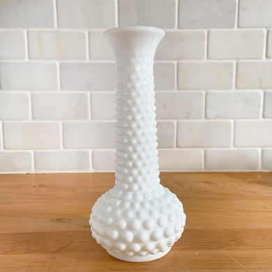 Classic vintage hobnail milk glass floral bud vase. Crafted by EO Brody, USA, circa 1950s. Create an elegant flower arrangement with this pretty vase. Suits farmhouse, shabby chic, cottage core, plus wedding or bridal decor. In excellent condition, free from chips. Measures 3 1/4 x 7 1/2 inches