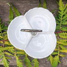 Load image into Gallery viewer, This vintage milk glass &quot;Hobnail&quot; 7 inch pressed glass handled bon bon dish brings all the drama in a small package! It features 3 rounded bowl with scalloped edge and silver-toned handle. Crafted by the Fenton Art Glass, USA, circa 1960s. A graceful piece of pressed glass in a classic pattern that will always be in style no matter your decor style! Fill with your favourite candies, nuts or snacks.  In excellent condition, free form chips/cracks.  Measures 7 x 5 inches
