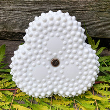 Load image into Gallery viewer, This vintage milk glass &quot;Hobnail&quot; 7 inch pressed glass handled bon bon dish brings all the drama in a small package! It features 3 rounded bowl with scalloped edge and silver-toned handle. Crafted by the Fenton Art Glass, USA, circa 1960s. A graceful piece of pressed glass in a classic pattern that will always be in style no matter your decor style! Fill with your favourite candies, nuts or snacks.  In excellent condition, free form chips/cracks.  Measures 7 x 5 inches
