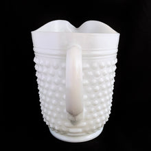 Load image into Gallery viewer, Gorgeous vintage mid-century white milk glass 65 ounce pitcher. Crafted by Anchor Hocking, USA, circa 1950s/60s. The personification of casual, fresh cottage style....a true classic that will always be on trend!  In excellent condition, free from chips/cracks.  Measures 7 1/4 inches tall
