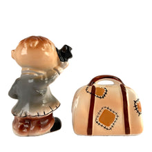 Load image into Gallery viewer, Rare vintage hand painted hobo tipping his top hat and suitcase ceramic salt and pepper shakers with corks. Enesco, Japan, 1950s. Add these unique shakers to your collection!

In excellent vintage condition, no chips/cracks/repairs. Original stickers.

Hobo measures 2 1/4 x 1 5/8 x 3 1/4 inches, suitcase measures 2 1/2 x 1 1/4 x 2 inches
