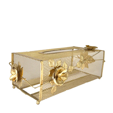 Fabulous vintage Hollywood Regency brass mesh tissue box cover with figural flowers and leaf gates to hold in the box of tissues.

In as found vintage condition with a couple of mindor dents in the mesh and wear to the metal.

Measures 11 1/4 × 5 3/8 × 4 1/4 inches