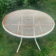 Load image into Gallery viewer, Overhead view of Homecrest vintage wrought iron round dining table — 48" folding top, mid-century modern design, 1950s
