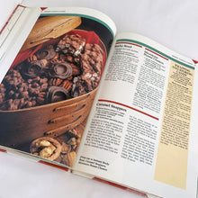 Load image into Gallery viewer, Better Homes and Gardens is known for its fabulous cookbooks. This hardcover cookbook focuses on Homemade Holiday recipes along with gift giving and kids crafting ideas. Its 80 pages are filled with amazing  recipes along with many colour photographs. Originally published by Meredith Corporation, USA, 1990.  In excellent condition with normal age-related yellowing.
