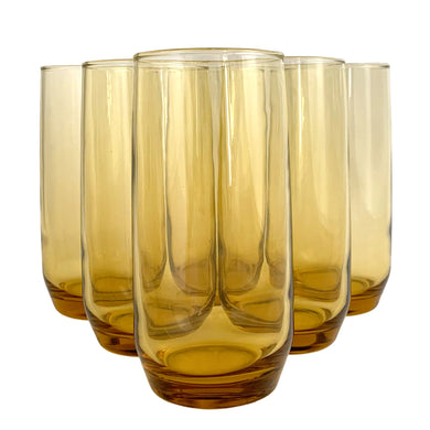 Set of six, vintage honey gold amber coloured cooler glasses. Perfect for everyday use, or as part of your barware collection.  Measures 2 1/2 x 5 7/8 inches  Capacity 16 ounces