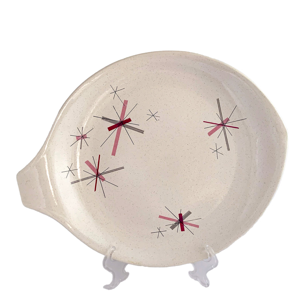 Vintage Hop Scotch Pink free form ceramic serving platter featuring pink and gray graphic stars on a beige speckled ground. Crafted by Salem China, USA, circa 1950s. Adds that mid-century atomic style to add to tableware collection! In excellent condition, free from chips/cracks/repairs. Maker's mark on the bottom. Measures 14 x 11 3/8 inches
