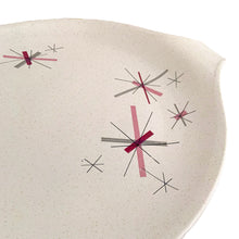 Load image into Gallery viewer, Vintage Hop Scotch Pink free form ceramic serving platter featuring pink and gray graphic stars on a beige speckled ground. Crafted by Salem China, USA, circa 1950s. Adds that mid-century atomic style to add to tableware collection! In excellent condition, free from chips/cracks/repairs. Maker&#39;s mark on the bottom. Measures 14 x 11 3/8 inches
