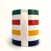 Load image into Gallery viewer, Classic vintage HBC Stripes ceramic coffee tea handled mug. Produced for the Hudson&#39;s Bay, Canada.   In excellent condition, free form chips/cracks. Marked with the HBC logo with the 2 deer stags on their hind legs and the Latin phrase &quot;Pro Pelle Cutem&quot;, meaning “a pelt for a skin”, which is the traditional motto of the Hudson&#39;s Bay Company (HBC). Dishwasher and microwave safe.  Measures 3 1/4 x 3 3/4 inches  Capacity 12 ounces
