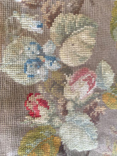 Load image into Gallery viewer, Close-up of floral needlepoint stitches showing small blue and cream flowers, pink rosebuds and green leaves
