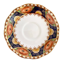 Load image into Gallery viewer, Vintage bone china Avon shaped Imari-style teacup and saucer, &quot;Un-Named Set #562&quot;. Each piece has a lovely scalloped edge featuring hand painted cobalt blue panels inset with orange poppy and yellow daisy flowers, topped by a band of white diamonds, trimmed with gold gilt. Crafted by Royal Albert, England, 1930s. Makes a beautiful gift or addition to your collection!
