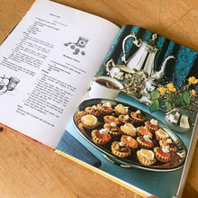 Load image into Gallery viewer, Creative Home Library is known for its fabulous cookbooks. This hardcover cookbook focuses on pickle and jam recipes. Its 160 pages are filled with amazing recipes along with many colour photographs. Originally published by Meredith Corporation, USA, 1971. This is the second printing 1964..   In great vintage condition with normal age-related yellowing.   
