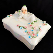 Load image into Gallery viewer, Bird's-eye view of full Lefton pixie vanity set: large white iridescent trinket box lid with reclining pixie and floral garland, scalloped edges
