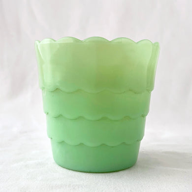Beautiful vintage Jadeite flower pot with scalloped design and rim. Produced by the Anchor Hocking Glass Company between 1948 - 1967. Use this sweet planter to keep your favourite houseplant or succulent. Easily repurposed as a candy dish or make-up brush or pencil holder.  In excellent condition, free from chips.  Measures 3 5/8 x 3 1/2 inches