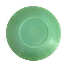 Load image into Gallery viewer, Vintage Fire-King &quot;Jane Ray&quot; pattern pressed glass jadeite cup and saucer featuring a ribbed pattern. Crafted by the Anchor Hocking, USA, 1945 - 1963. Highly collectible and suits a number of decor styles including farmhouse, shabby chic, mid-century modern, and kitsch kitchen. In excellent condition, free from chips/cracks/repairs. Maker&#39;s mark present on the bottom of each piece, see photos. Cup measures 3 3/4 x 2 1/4 inches | saucer measures 4 1/8 inches
