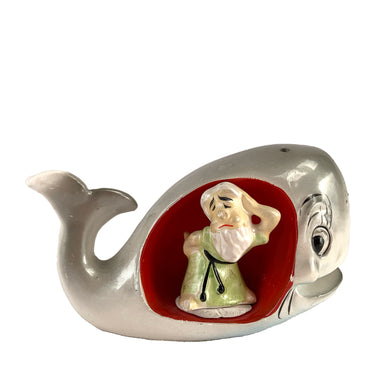 Vintage hand painted Jonah and the Whale ceramic salt and pepper shakers with corks. Enesco, Japan, 1990s. Add these unique shakers to your collection!

In good vintage condition, no chips/cracks/repairs. Whale has some wear. Unmarked

Whale measures 3 3/4 x 1 7/8 x 2 1/8 inches, Jonah measures 1 1/8 x 7/8 x 1 1/2 inches