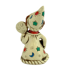 Load image into Gallery viewer, Josef Originals Libra Zodiac wizard figurine, rear view, showing the back of the cream robe with multicolour celestial motifs including red, blue, teal, and gold stars and moons, brown braided hair, tall white wizard hat, Josef Originals oval sticker visible on lower robe
