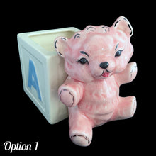 Load image into Gallery viewer, Vintage Kay Finch designed, hand painted ceramic figural pink teddy bear ABC baby block planter. Crafted by Shafford, Japan. Add this adorable planter to your nursery decor. Fill with a little plant or use to store baby care accessories. In as found vintage condition, see photos for details of imperfections. Measures 6 x 3 3/4 x 5 1/2 inches
