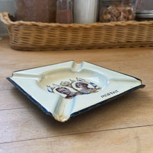 Load image into Gallery viewer, Vintage King George VI and Queen Elizabeth 1932 Coronation enamel on metal commemorative ashtray. Moffat Stove Company, England. Perfect for the British monarchist collector!  In as found vintage condition with wear to the enamel. Marked &quot;MOFFAT&quot;.  Measures 4 1/2 x 4 1/2 inches
