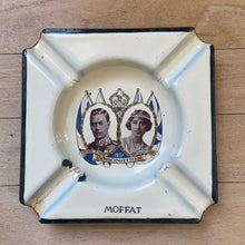 Load image into Gallery viewer, Vintage King George VI and Queen Elizabeth 1932 Coronation enamel on metal commemorative ashtray. Moffat Stove Company, England. Perfect for the British monarchist collector!  In as found vintage condition with wear to the enamel. Marked &quot;MOFFAT&quot;.  Measures 4 1/2 x 4 1/2 inches
