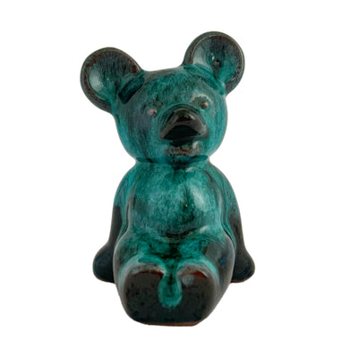 Adorable vintage green drip glazed Koala Bear art pottery figurine. Crafted by Blue Mountain Pottery, Canada, circa 1970s. Add this sweet little bear to your BMP collection!  In excellent condition, free from chips/repairs. Faint script on the back of the bear reads, 