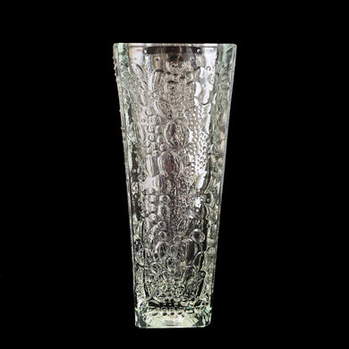 A rare find. Vintage Krople Rosy or Dew Drops heavy-weighted clear art glass vase features a plethora of multi-sized recessed clear bubbles which makes it sparkle in the light. Designed by Erika Trzewik-Drost and produced Huta Szkła Hortensja in Poland, circa 1970s. An impressive gift! Despite a burst bubble on one edge (as a result of the manufacturing process), the vase is in excellent condition without any chips or cracks. Measures 3 1/2 x 3 1/2 x 9 inches