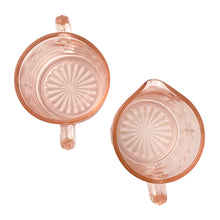 Load image into Gallery viewer, Overhead view of the sugar bowl and creamer, showing the rims and starburst pattern on the bases


