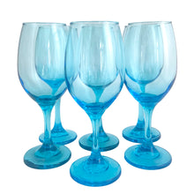 Load image into Gallery viewer, Set of six Libbey Laser Blue LRS60 wine glasses clustered in a pyramid, front view showing rounded bowls, slender stems, and round bases
