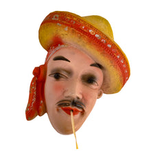 Load image into Gallery viewer, Charming and scarce, this vintage chalkware wall hung string holder featuring a handsome Latin American man wearing a red and yellow sombrero and scarf was a pleasure to find in such amazing condition! Dates to the 1940s. A wonderfully decorative piece!  In excellent vintage condition with minor wear to the paint, no chips/cracks/repairs.  Measures 6 1/4 x 2 3/4 x 7 3/8 inches

