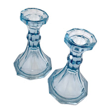 Load image into Gallery viewer, Pair of tall vintage dark blue &quot;Virginia&quot; pressed glass single lite candle holders. Crafted by Fostoria Glass, USA, 1980 - 1986. A beautiful way to add ambience to your home decor.  In excellent condition, new old stock, free from chips.  Measures 3 7/8 x 6 inches
