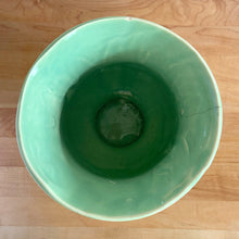 Load image into Gallery viewer, Looking down into the vase, showing the glossy interior glaze, hairline crack and rim with chip
