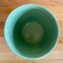 Load image into Gallery viewer, Highly collectible vintage light green roses ceramic jardiniere planter. Crafted by McCoy Pottery, USA, 1950. The perfect home for your favourite greenery or flowers! This rare piece is a must-have for any art pottery collector!

In excellent vintage condition, no chips/cracks/repairs, normal age-related crazing and manufacturer&#39;s glaze pops. Maker&#39;s mark.

Measures 7 1/2 x 6 5/8 inches
