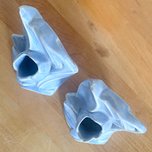 Load image into Gallery viewer, Striking vintage matte lilac water lily bookends. Crafted by Nelson McCoy Pottery, 1940s. These rare bookends are a must for any McCoy art pottery collector!

In as found vintage condition, with a couple of chips, see photos. Maker&#39;s marks on both pieces.

Measures 6 1/4 x 5 1/2 inches
