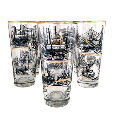 Set of seven vintage pint glasses featuring black, white and gold locomotive trains. Crafted by Libbey Glass, circa 1950s. A great addition to your barware collection or perfect for the train enthusiast!  In excellent condition, no chips. Marked on the bottom with the Libbey 