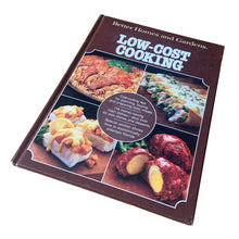 Load image into Gallery viewer, Better Homes and Gardens is known for its fabulous cookbooks. This hardcover cookbook focuses on Low-Cost Cooking recipes. Its 96 pages are filled with amazing recipes along with many colour photographs. Originally published by Meredith Corporation, USA, 1980. This is the first edition, forth printing, 1981.

In great vintage condition.
