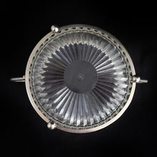 Load image into Gallery viewer, Clear faceted lucite plastic lidded vanity box nestled in a silver ormolu handled caddy. The silver-toned metal ormolu caddy has two handles and three ball feet. An excellent addition to your boudoir or bathroom vanity for powder or trinkets. In excellent vintage condition, free from chips. Measures 5 1/8 x 3 1/2 (not incl. handles)
