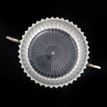 Load image into Gallery viewer, Clear faceted lucite plastic lidded vanity box nestled in a silver ormolu handled caddy. The silver-toned metal ormolu caddy has two handles and three ball feet. An excellent addition to your boudoir or bathroom vanity for powder or trinkets. In excellent vintage condition, free from chips. Measures 5 1/8 x 3 1/2 (not incl. handles)
