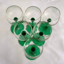 Load image into Gallery viewer, A vintage mod set of six elegant Luminarc emerald green stemmed wine glasses. Crafted by J.G. Durand Cristal d&#39;Arques, France, circa 1970s. We are loving the vibrancy of the stems that will add that perfect pop of colour to your barware...cheers!  In excellent  condition free from chips. Marked &quot;luminarc FRANCE&quot; on the bottom.  Measures 2 3/4 x 6 1/2 inches  Capacity 5 ounces   
