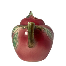 Load image into Gallery viewer, Vintage mid-century era hand painted majolica-style figural red apple ceramic lidded sugar bowl featuring brown branch handles and green leaves. Crafted by Metroware, Japan, 1940s. This sweet apple is perfect for adding a touch of kitsch to your kitchen and table decor!

In excellent condition, no chips, cracks or repairs. Age-related crazing.

Measures 4 1/2 x 3 1/4 x 3 3/4 inches

