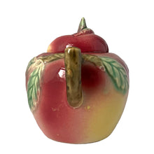 Load image into Gallery viewer, Vintage mid-century era hand painted majolica-style figural red apple ceramic lidded sugar bowl featuring brown branch handles and green leaves. Crafted by Metroware, Japan, 1940s. This sweet apple is perfect for adding a touch of kitsch to your kitchen and table decor!

In excellent condition, no chips, cracks or repairs. Age-related crazing.

Measures 4 1/2 x 3 1/4 x 3 3/4 inches
