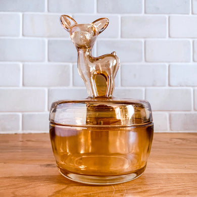 Imagine having this whimsical deer fawn jar adorn your dresser! This is a marigold carnival glass powder jar with poodle finial, produced by in the Jeannette Glass, USA, circa 1930s/40s. Perfect for trinkets or use as a candy dish.  In excellent condition, no chips or cracks.  Measures 4 x 6 inches