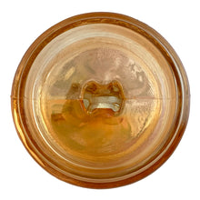 Load image into Gallery viewer, Underside lid detail of embossed deer fawn motif detail on vintage marigold carnival glass powder jar by Jeannette Glass
