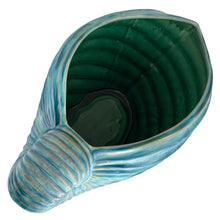 Load image into Gallery viewer, Top view of vintage nautilus shell planter showing organic ridged texture and blue glaze

