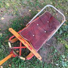 Load image into Gallery viewer, Classic vintage mid-century Mastercraft children&#39;s snow sled. The model is No. 570100. This sled features a steel frame with wood skis, deck and steering bar, metal backrest and mattress cushion. Crafted by Canadian Tire Corporation, Canada, 1960s. Bring back all the wonderful of snowy winter days with this beloved wee sled!

In as found vintage condition with wear to the entire piece commensurate with use and age. Original sticker present.
