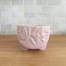 Load image into Gallery viewer, Vintage Art Deco matte pink Butterfly Line fernery. Crafted by Nelson McCoy Pottery, early 1940s. This rare piece is must for any McCoy art pottery collector!

In excellent condition, tiny flea bite on interior rim, no chips/cracks/repairs. Maker&#39;s mark.

Measures 8 1/2 x 4 x 3 3/8 inches
