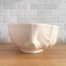 Load image into Gallery viewer, Vintage Art Deco large matte white glazed lotus centrepiece console bowl. Crafted by Nelson McCoy Pottery, 1940s. This rare piece is must for any Nelson McCoy art pottery collector!

In good vintage condition, minor flea bite on the inner edge, no cracks or repairs. Typical manufacturers glaze bubbles. Maker&#39;s mark.

Measures 12 x 7 1/2 x 4 inches
