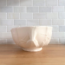 Load image into Gallery viewer, Vintage Art Deco large matte white glazed lotus centrepiece console bowl. Crafted by Nelson McCoy Pottery, 1940s. This rare piece is must for any Nelson McCoy art pottery collector!

In good vintage condition, minor flea bite on the inner edge, no cracks or repairs. Typical manufacturers glaze bubbles. Maker&#39;s mark.

Measures 12 x 7 1/2 x 4 inches
